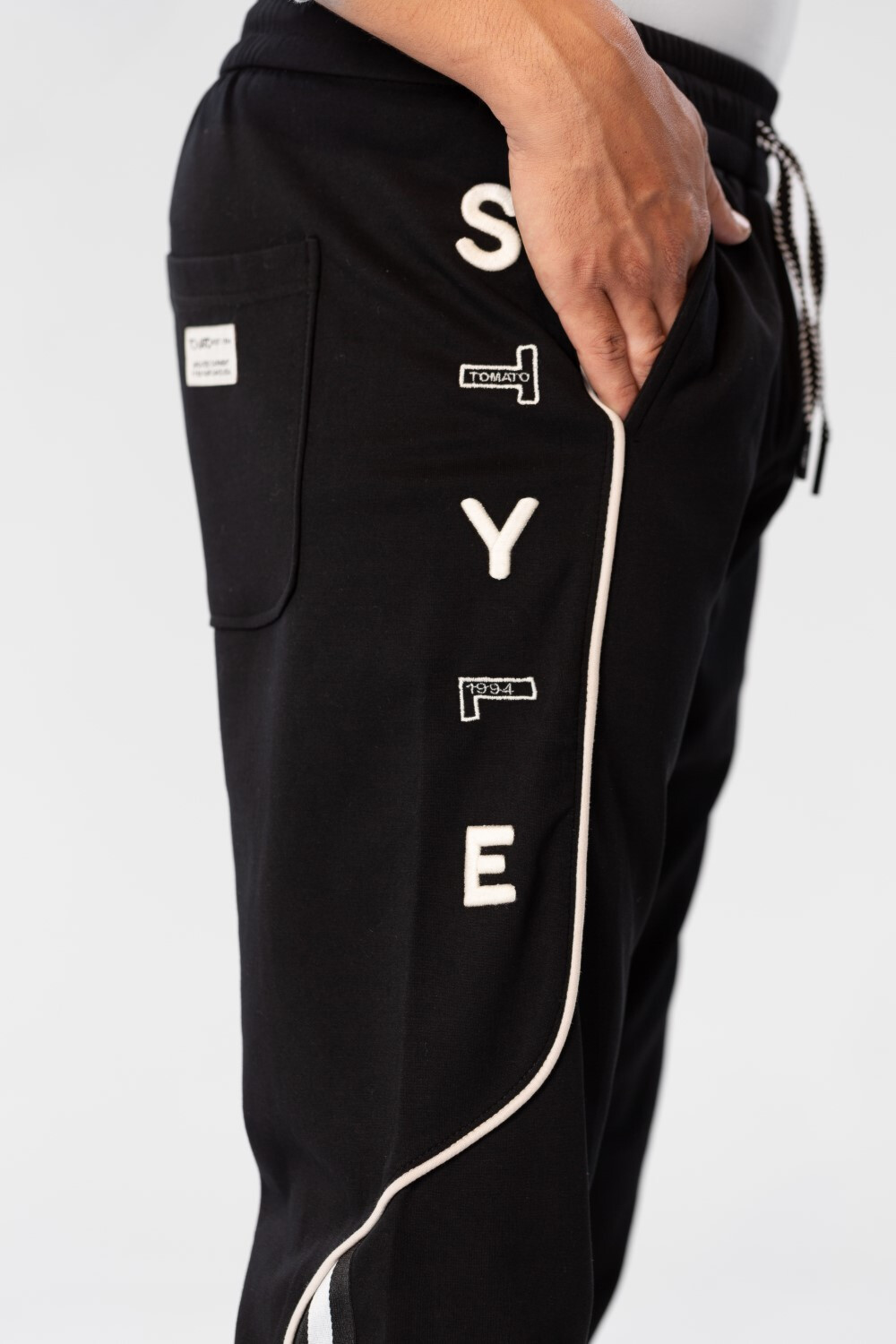 Men's Sports Pants With A Modern Fit And A Text Print On The Side